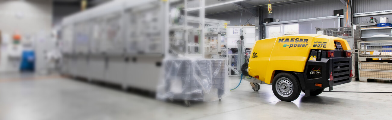 MOBILAIR M 27E compressor in the production facility at Unimatic Automationssysteme.